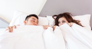 A couple in bed