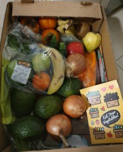 A box full of fruits and vegetables