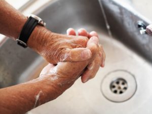 A man washing his hands